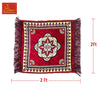 Red velvet mandir mat with central floral medallion and decorative border, dark fringe