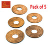Five copper coins with center holes, round ornate discs arranged flat
