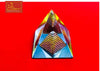 Crystal pyramid with rainbow striped facets, angled top view.
