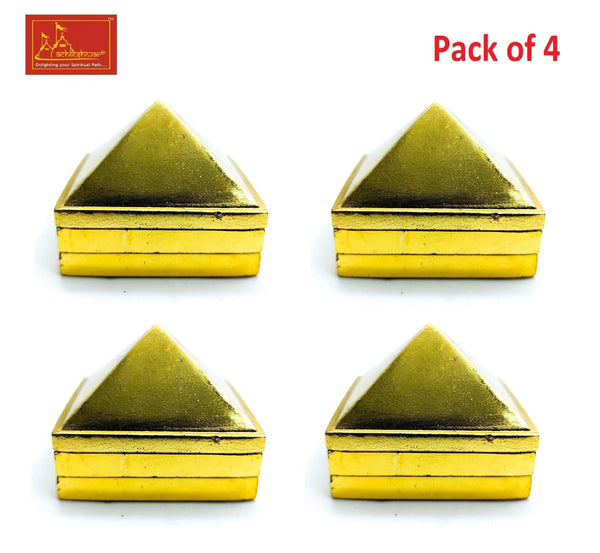 Gold-toned pyramid ornament set, four small pyramids with flat bases