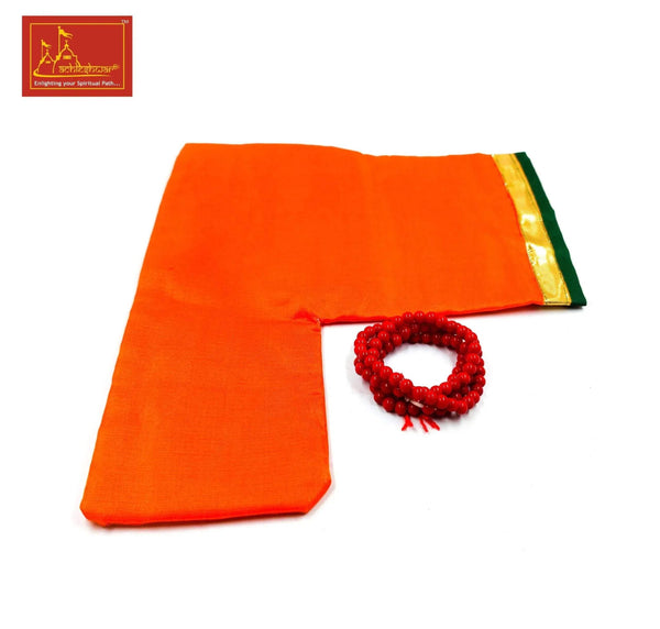 Orange-red fabric pouch with gold edge and small red bead bracelet with tassel