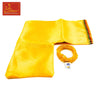 Yellow cloth pouch with yellow hakik mala beads and small blue label tag