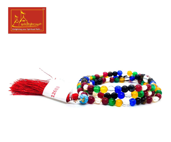 Multicolor beaded mala necklace with red tassel, laid flat
