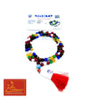 Multicolor bead mala with tassel, laid in a circle