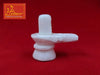White marble shivling with cross base and smooth ribbed linga top