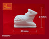White marble Nandi bull figurine, 2.5 in long and 2 in tall, seated