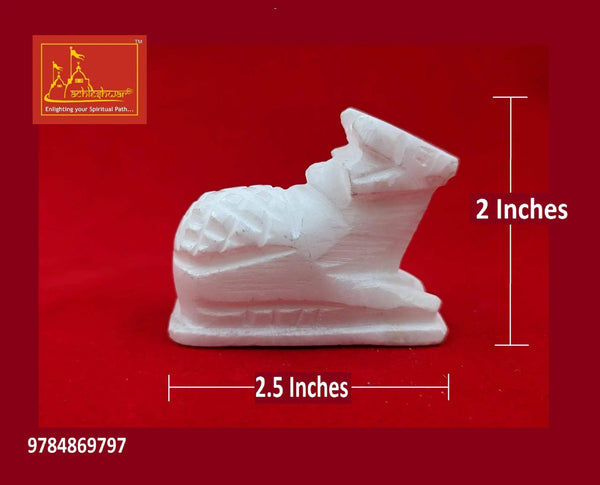 White marble Nandi bull figurine, 2.5 in long and 2 in tall, seated