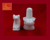 White marble Nandi and Shivling figurines, front view of both pieces
