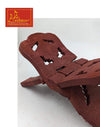 Mango wood rehal book stand, angled view with carved cutout slots