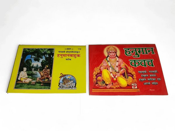 Two Hanuman prayer books, yellow and red covers, shown side by side