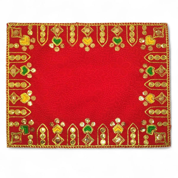 Red velvet pooja aasan cloth with textured center and gold border with temple motifs