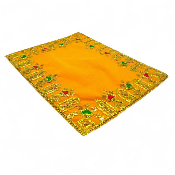 Yellow velvet pooja asan cloth with gold border and multicolor embroidered corner motifs