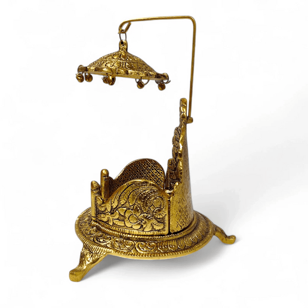 Antique gold singhasan with arched handle, carved seat, and ornate base feet