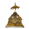 Gold metal hanging elephant throne with red cushion and decorative base