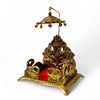 Gold metal elephant throne with red seat, two side elephants and arched canopy