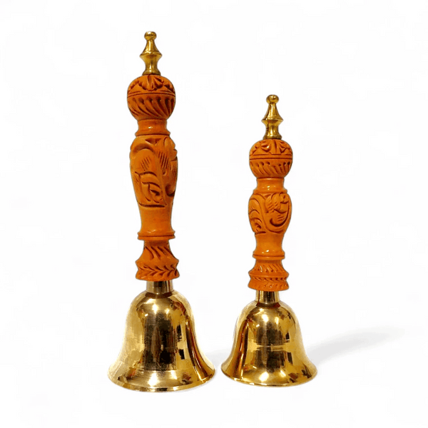 Bronze pooja bell set with two carved orange handles and gold-toned flared bells