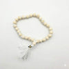 White wood bead mala necklace with knot detail and dangling tassel