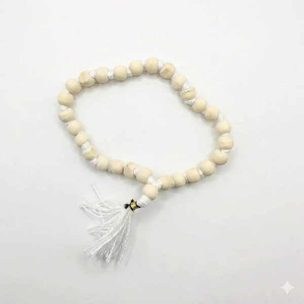 White wood bead mala necklace with knot detail and dangling tassel