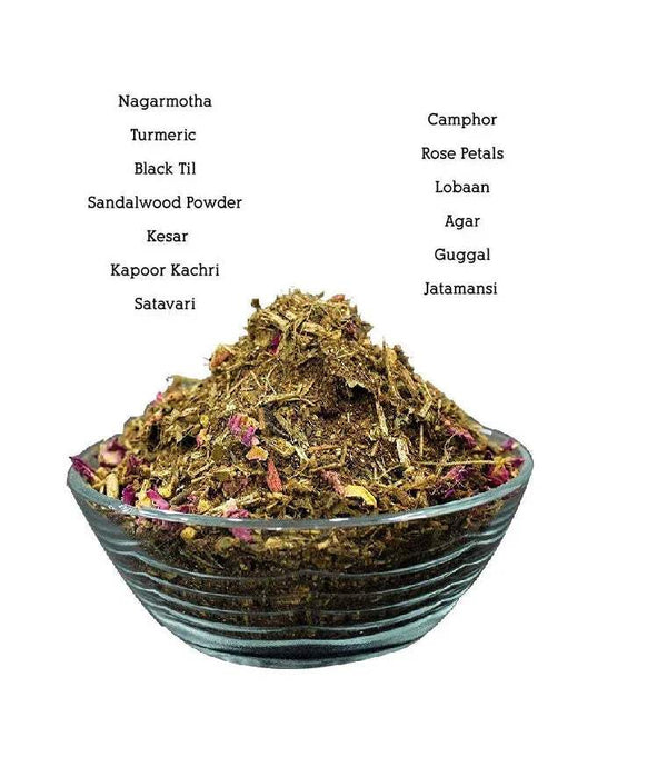 Hawan samagri mixture in a teal bowl, with dried herbs and rose petal pieces