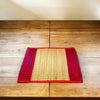 Darbha grass mat with maroon border and light straw center, rectangular