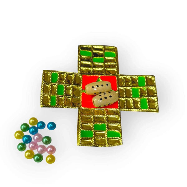 Miniature dice board game toy with gold, green and red grid cross and dice pieces