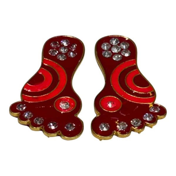Pair of Krishna charan toys, red enamel with gold trim and crystal rhinestones