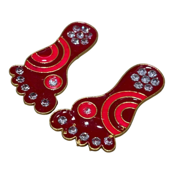 Krishna charan toy, red enamel with gold edges and rhinestone studs