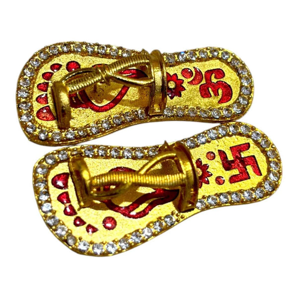 Miniature chappal slippers in gold with red designs and rhinestone trim