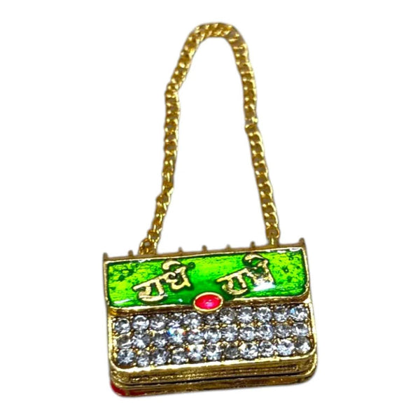 Miniature jeweled purse with green enamel front and red oval gem, gold chain handle.