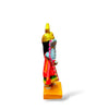 Side-view blue-skinned goddess statue with gold crown, red skirt, raised arm, yellow base