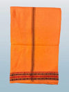 Orange cotton dhoti with dark vertical panel and red geometric border along the bottom