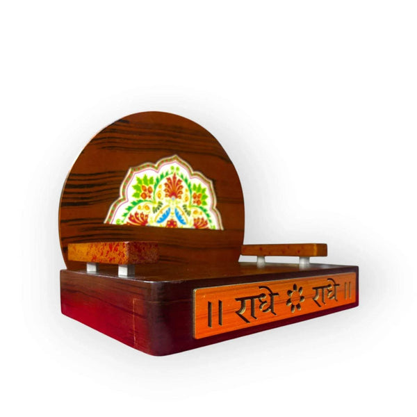Wooden devotional throne with arched back and colorful center artwork; side view