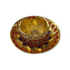 Gold miniature cup with maroon gem-pattern base plate