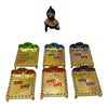 Miniature metal bed set with gold frames, red/green/blue panels, and carved border