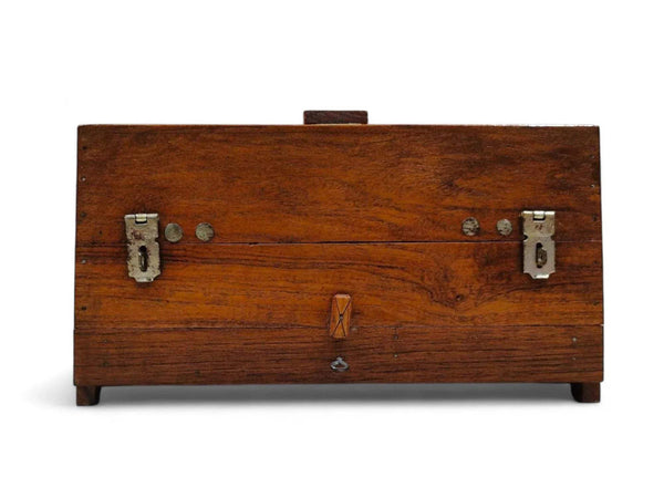 Wooden jhapiji box back with metal clasps and hanging loop, closed