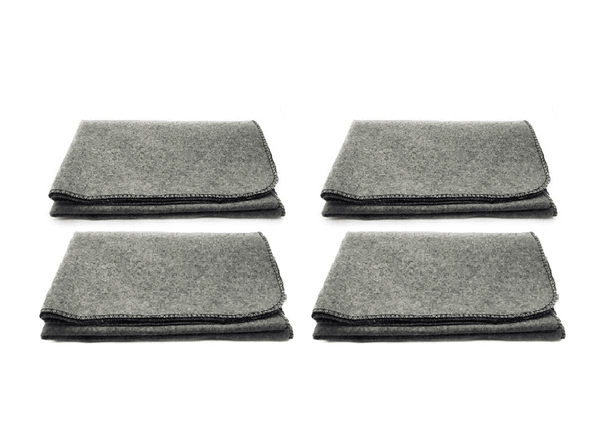 Set of four grey woolen puja asan mats stacked with dark stitched border