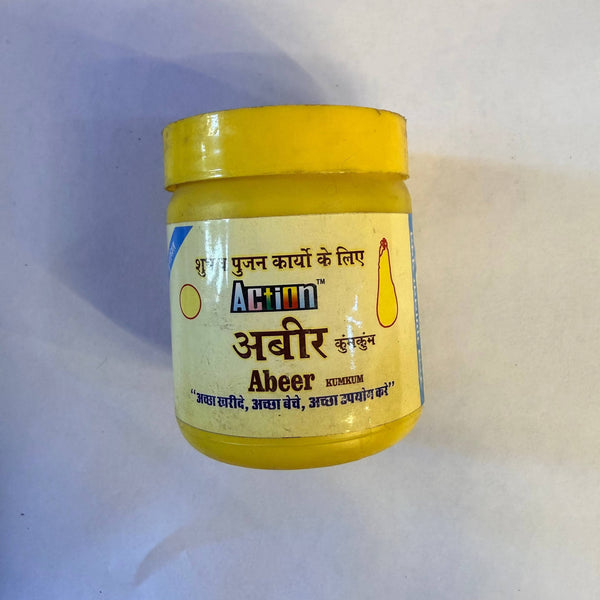 Action Abeer kumkum powder jar, yellow lid and light yellow front label