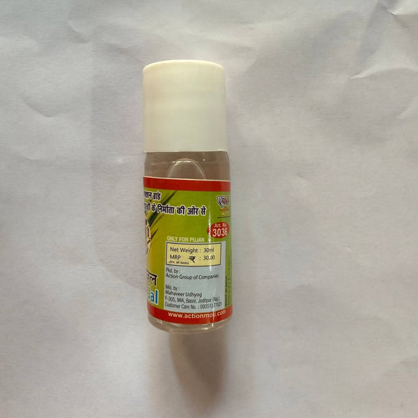 Action Kewda jal bottle with white cap, amber liquid, label on front