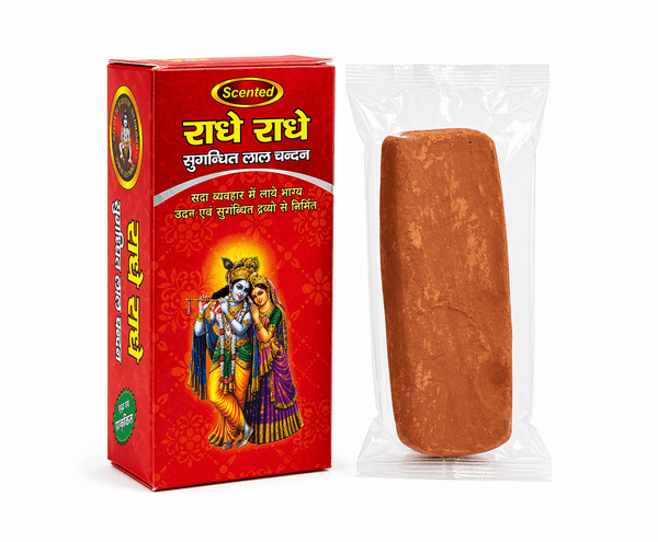 Red scented tilak box and wrapped brown Gopi Chandan tilak piece