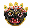 Decorative black bhoot face mask with gold ears, green eyes, and red mouth