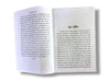 Open book with printed text pages, showing the spine and page edges