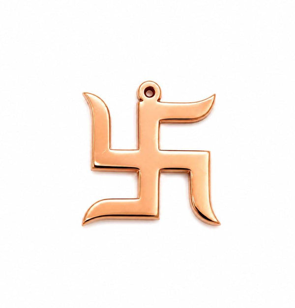 Copper swastik ornament close-up in copper tone with top hanging loop