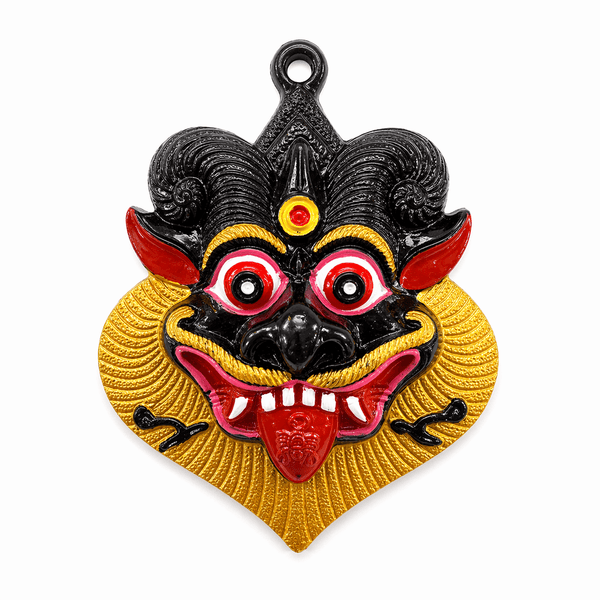 Heart-shaped bhoot face mask charm with black, red, and gold detailing and loop top