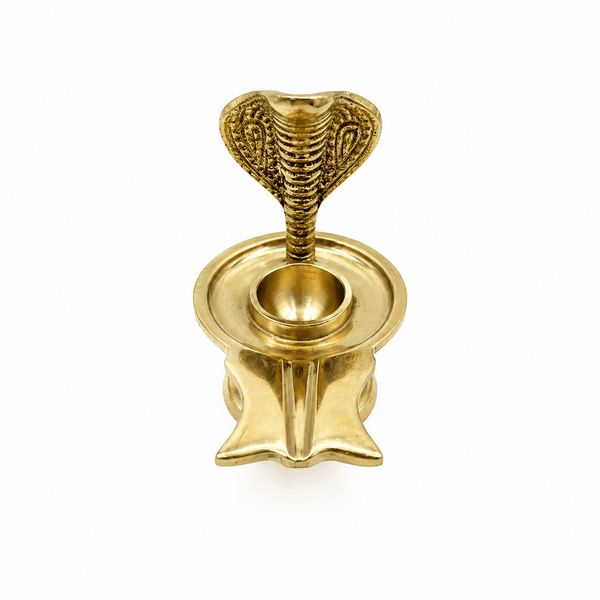 Brass pooja stand with Sheshnag cobra figure, circular base and central small cup
