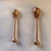 Copper pooja spoon set, rounded bowl with textured handle, two spoons shown