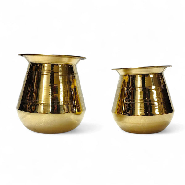Two brass lota kalash containers with wide rims and rounded bases, polished finish