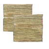 Set of darbha grass mats, stacked woven rectangles in green and straw tones