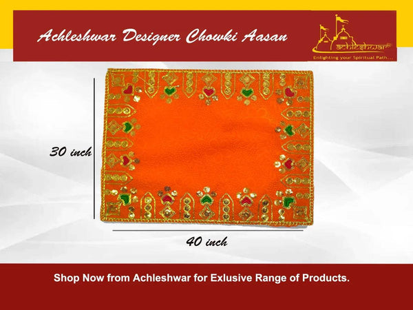 Orange velvet pooja aasan cloth with ornate gold, green and red embroidery