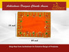 Orange velvet pooja aasan cloth with gold, green and red decorative trim