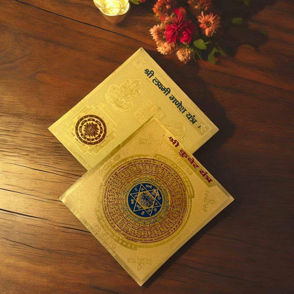 Gold-plated yantra cards with intricate circular geometric symbols